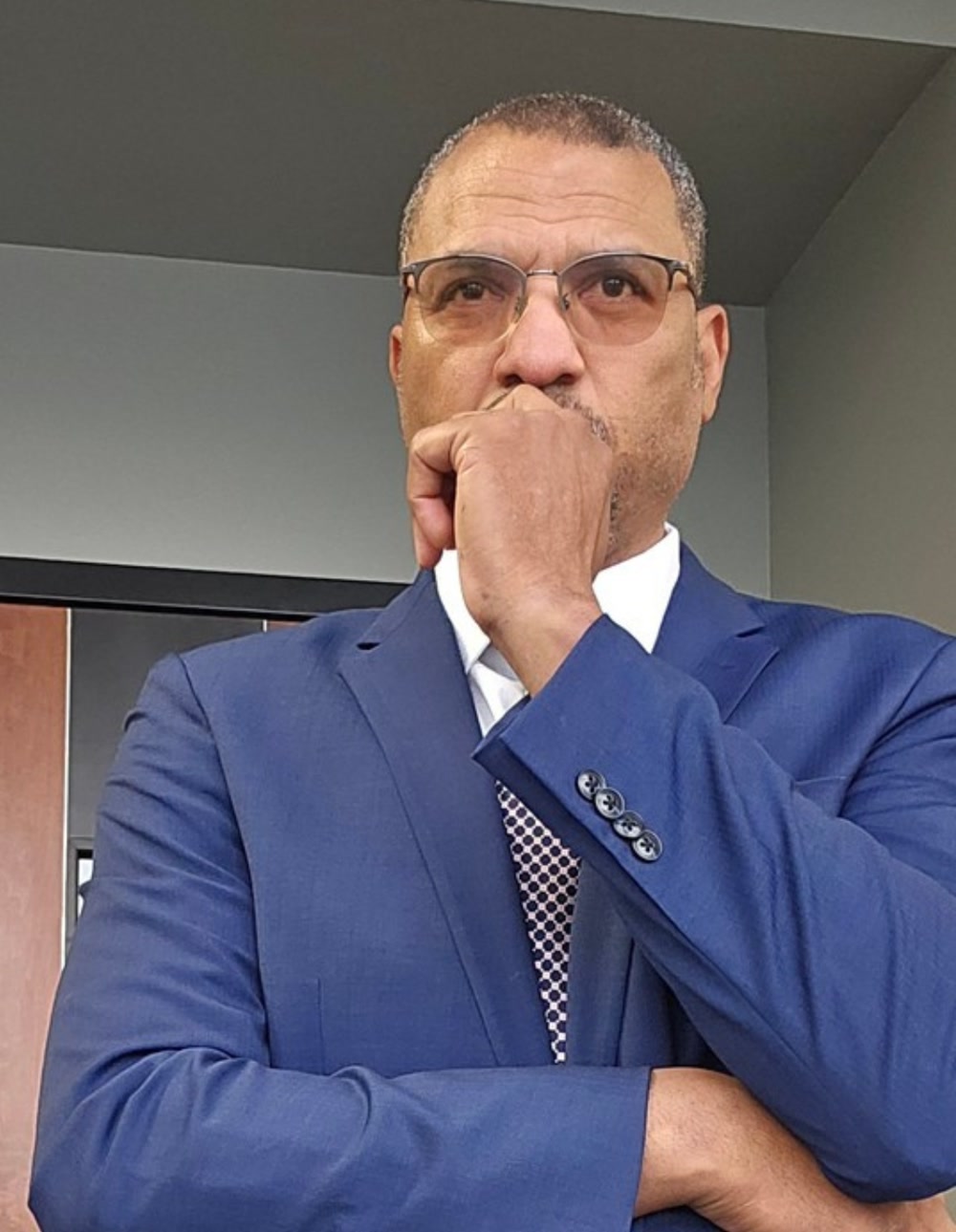 James W. Armstrong, Jr. in a blue suit